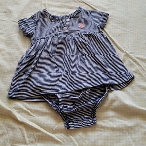 Dress with button closure